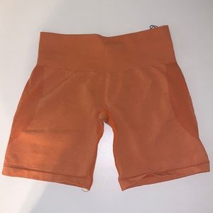 NVGTN Burnt Orange Contour Seamless Shorts
